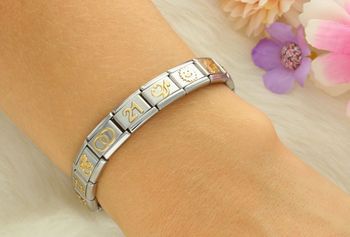 5Zawieszka Nomination 'Stetoskop' z kolekcji Link – stal szlachetna i złoto 18K. Idealny symbol dla lekarzy, pielęgniarek i studentów medycyny. Spersonalizuj swoją bransoletkę! (1).jpg